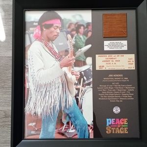 Jimi Hendrix portrait with actual pieces of the stage and ticket